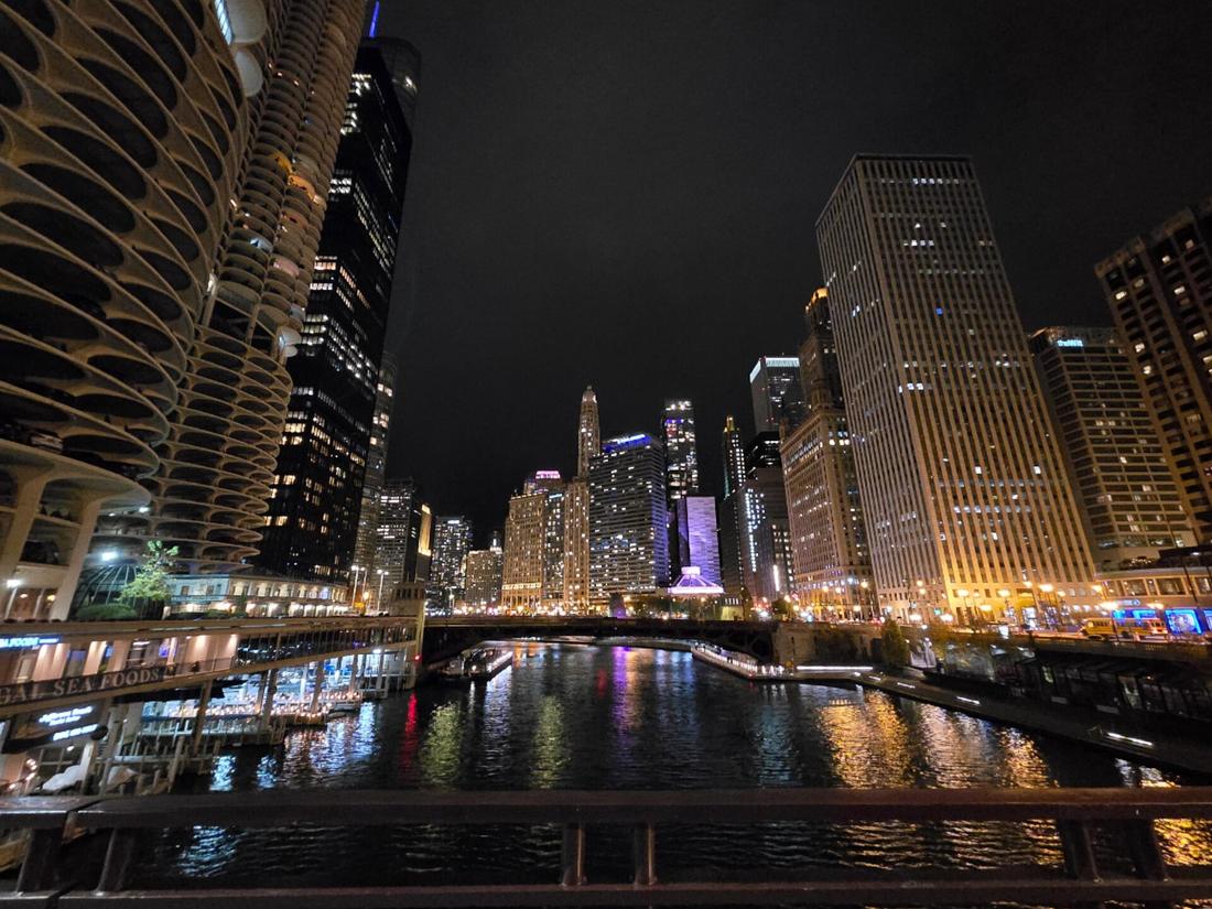 The Chicago skyline above the Chicago River at night
