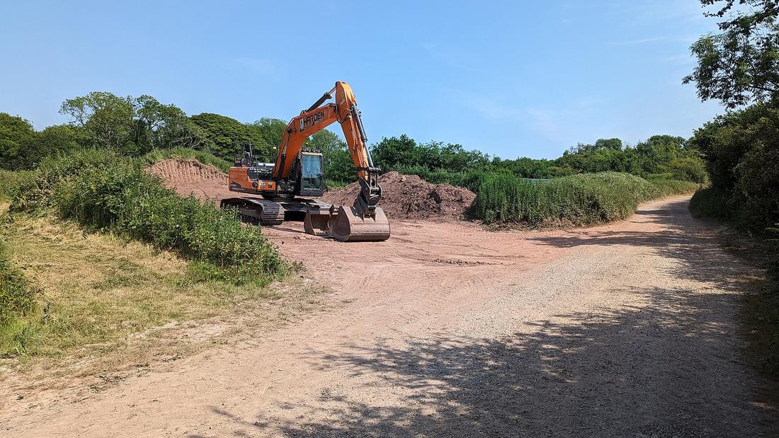An excavator working a construction site