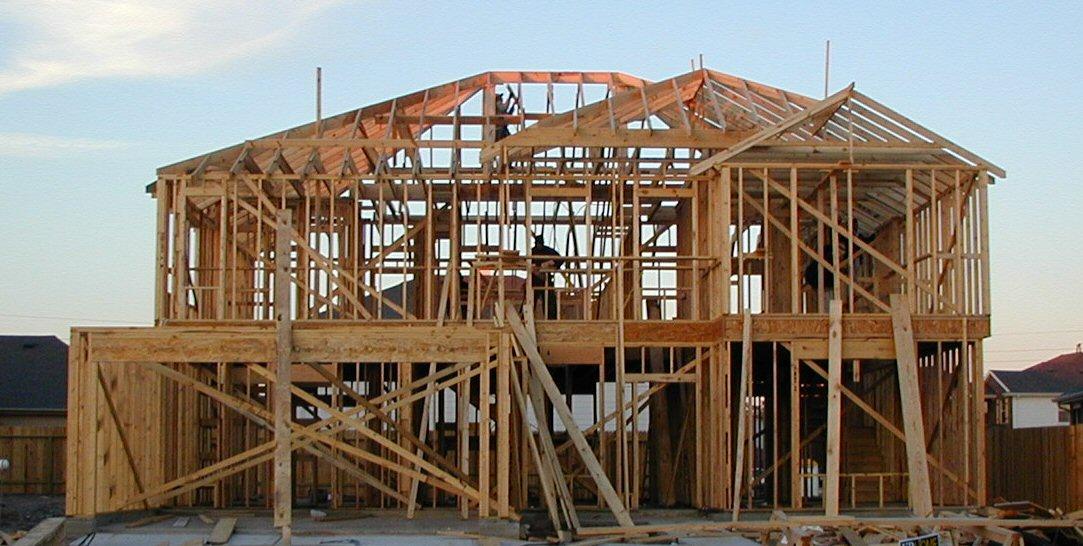 A wood-framed house under construction