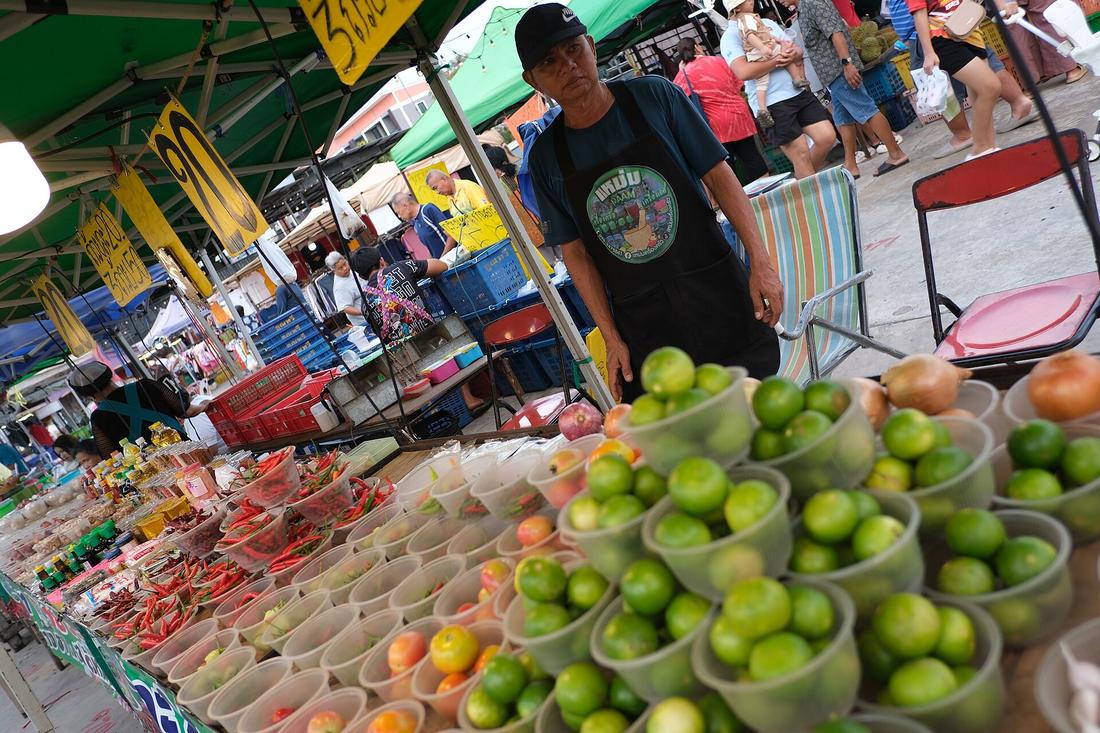 Fresh produce piled high at a market stall