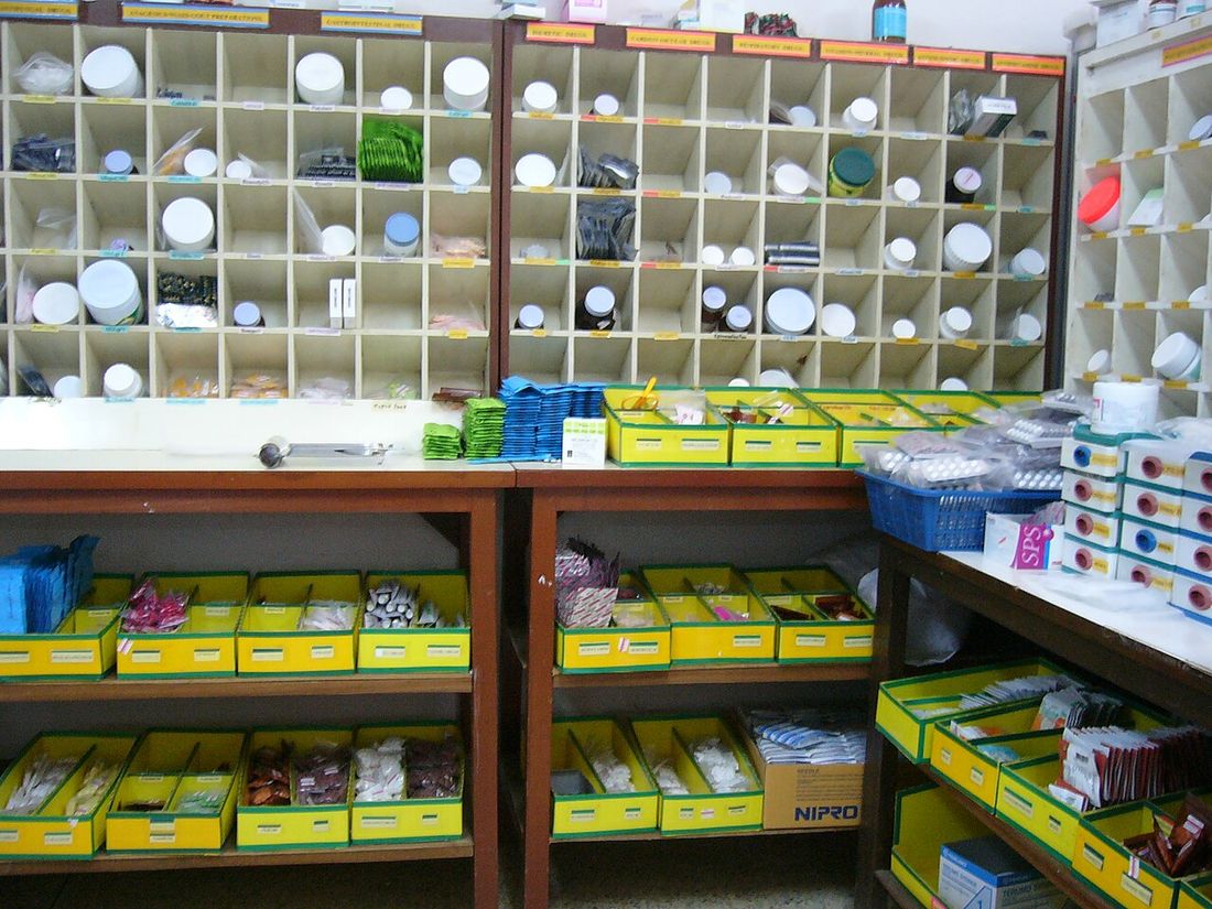 Shelves of medicines and supplies in a hospital pharmacy