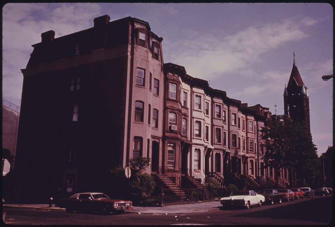 A block of brownstone row houses in Park Slope, Brooklyn